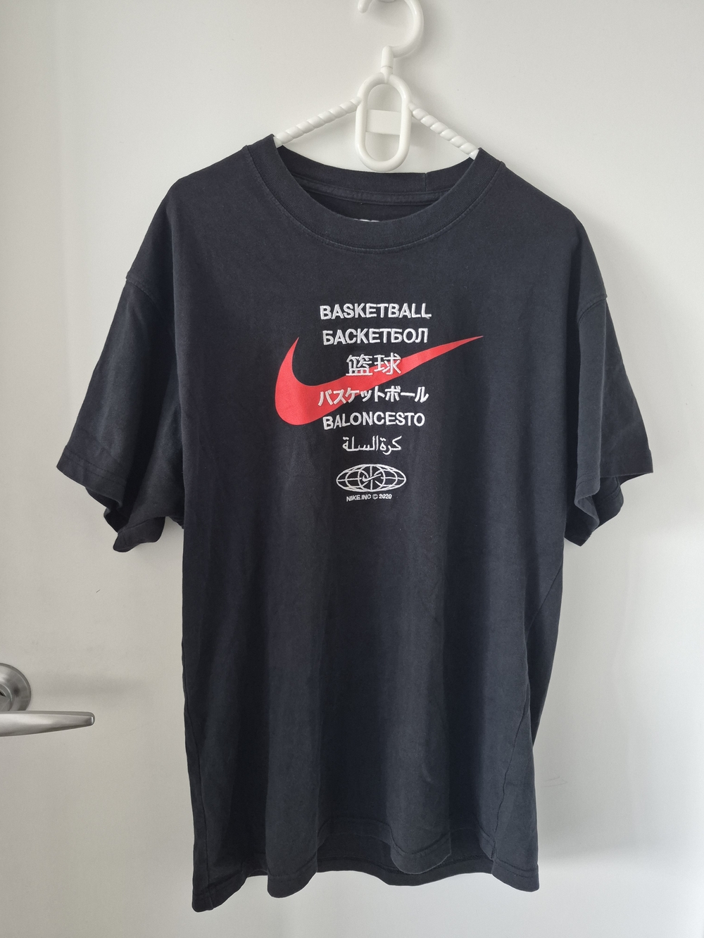 Nike Black Short-Sleeve Basketball Graphic Tee with Red Swoosh